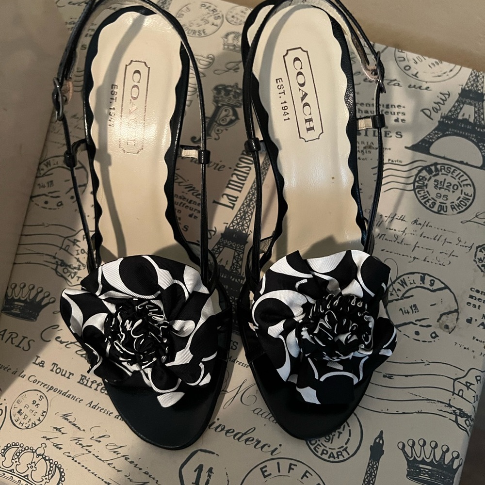 Coach black signature flower heels.